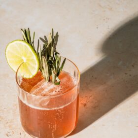 clear drinking glass with orange juice